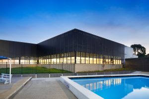 Perforated sheet metal facade by Arrow Metal - Bunburry Swimming Pool project
